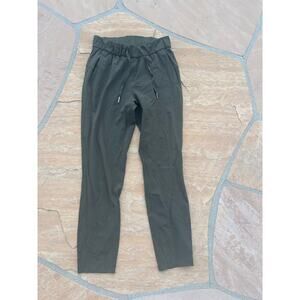 Lululemon On The Fly Pant OLIVE GREEN SIZE 2 7/8 LENGTH PANTS NYLON LYCRA